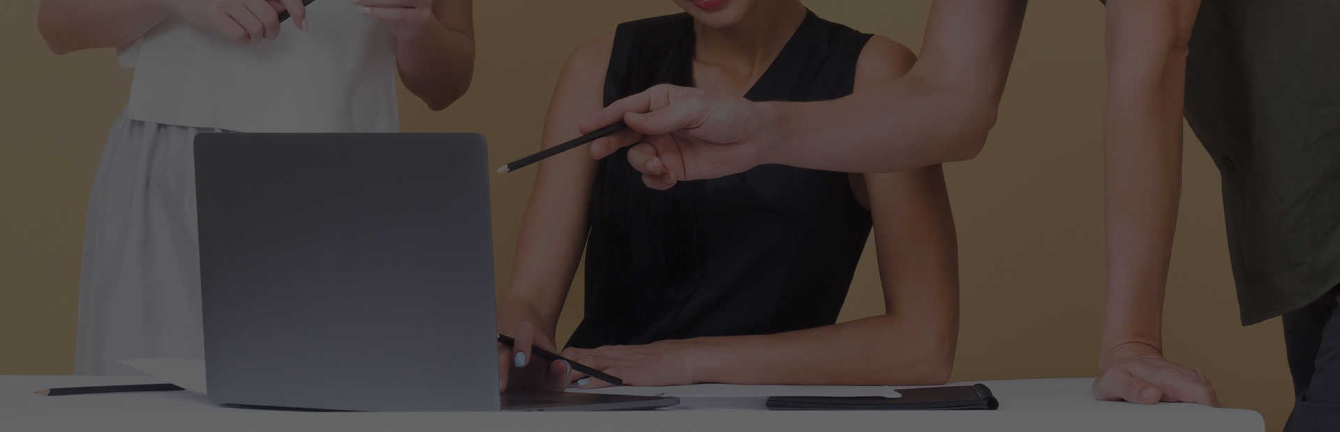 Professionals working on documents and computers